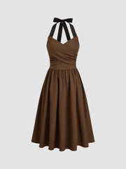 Halter Neckline Criss Cross Knotted Pocket Midi Dress