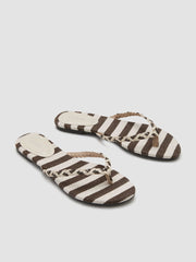 STRIPED MOVEN FLIP-FLOP SLIPPERS