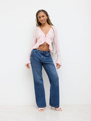 V-neck Broderie Anglaise Knotted Ruffle Hem Long Sleeve Top