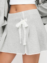 Cotton-blend Mid Rise Contrasting Lace Bowknot Pleated Mini Skirt